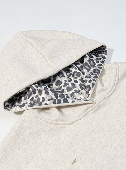 Back view of gray animal pattern patchwork perforated sweatshirt by Grozavu