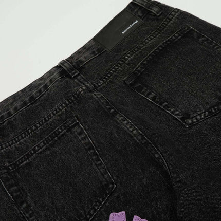 Retro Cross Flared Denim Pants – Slim Fit back view showcasing cross appliqué detailing and clean stitching.
