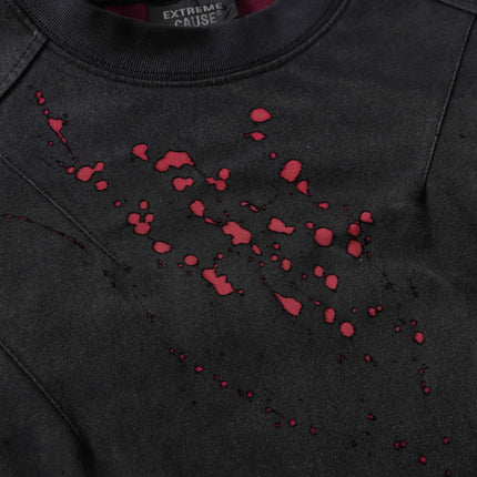 Retro Splatter Print T-Shirt – Loose Fit featuring a playful black and red splatter design.