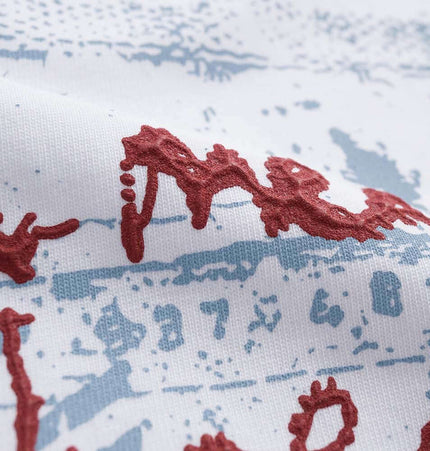 Retro Washed Face Letter TShirt – Loose Fit close-up of graphic detail on fabric