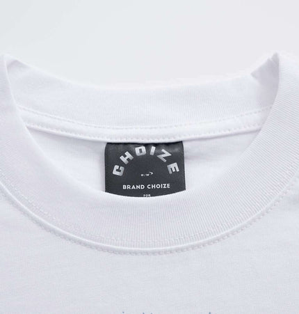 Close-up of the collar and label of the Retro Washed Face Letter TShirt – Loose Fit in white.