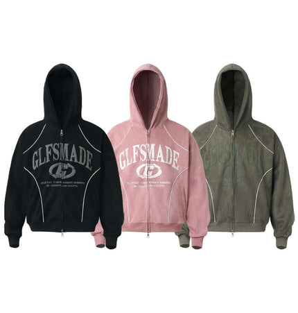 Faux Suede Printed Hoodie – Loose Fit in three colors: black, pink, and green with zipper and logo design.