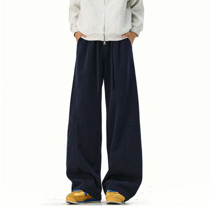 Heavyweight Wide-Leg Pants - Loose Fit worn with a gray hoodie and yellow shoes, showcasing a stylish wide-leg design.
