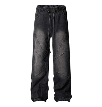 Distressed Pleated Reverse Denim Pants in black with structured design and washed finish.