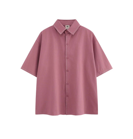 Minimal Casual Loose Short Sleeve Shirt in a soft pink color with a flip collar and loose fit.
