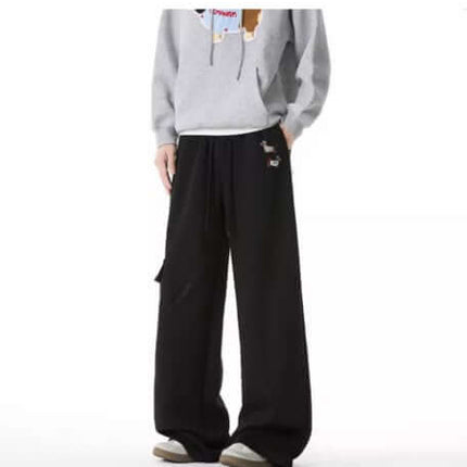 Embroidered Dog Sweatpants – Loose Fit displayed with a cozy hoodie, showcasing dog embroidery and retro streetwear style.