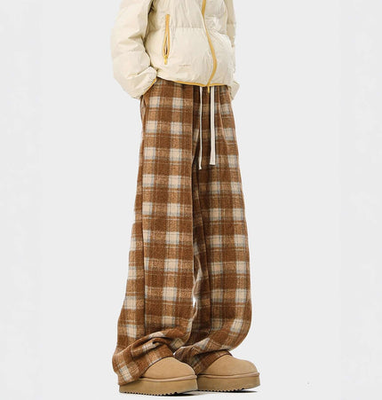 Fleece-Lined Winter Pants - Loose Fit shown in a relaxed, vintage street-style brown plaid design for cold weather.
