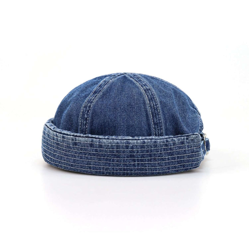 Model wearing Denim blue washed denim melon skin hat by Grozavu