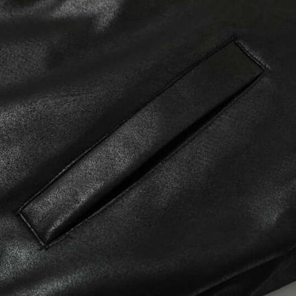 Close-up of the stylish pocket detail on the Faux Fur Hooded Jacket – Street Style, showcasing its modern design.