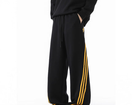 Pantalones de chándal pesados para hombres con patrón de tres rayas, pierna recta suelta, pantalones informales de otoño, diseño de pierna ancha y fluida