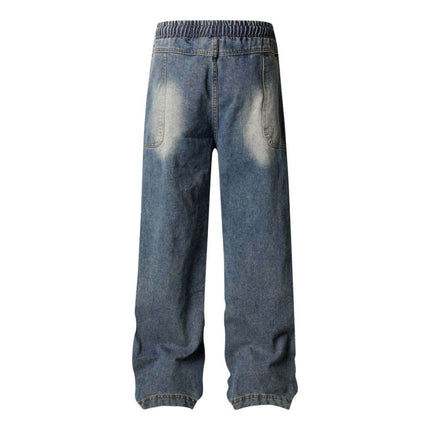 Distressed Pleated Reverse Denim Pants showing the back view with a washed finish and relaxed fit.