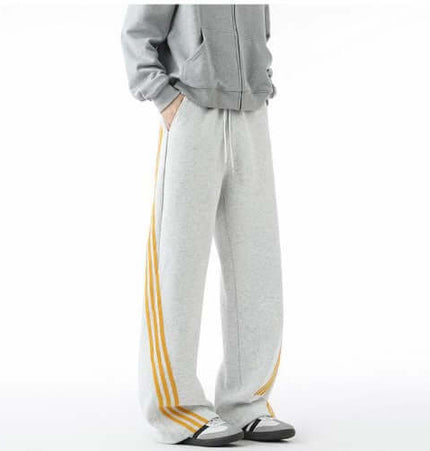 Heavyweight Three-Stripe Pants - Loose Fit with a sporty design and comfortable loose fit style.