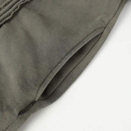 Stripe Patchwork Hoodie – Loose Fit showing the fabric texture and cuff details.