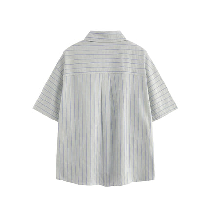 Back view of the Patch Striped Short Sleeve Shirt - Loose Fit in light blue with a relaxed silhouette.