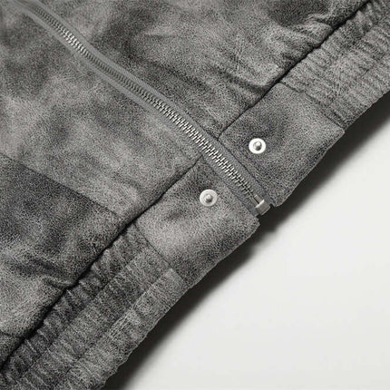 Close-up of the zipper detail on the Hooded Fur Collar Jacket – Loose Fit in gray fabric.