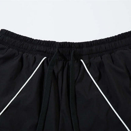 Tape Decorated Casual Wide-Leg Pants close-up view of waistband and contrast stripe detailing.