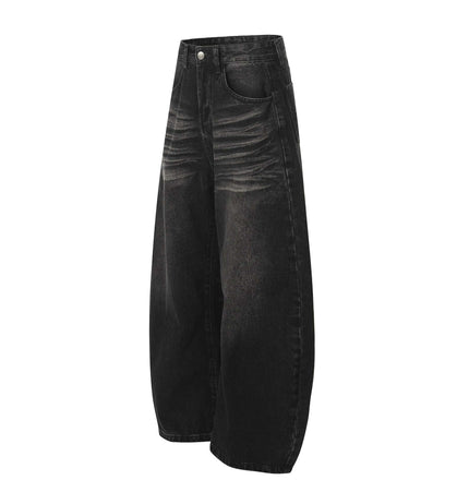 Washed Black Vintage Knife Cut Jeans with relaxed fit and cat whisker fade detail.