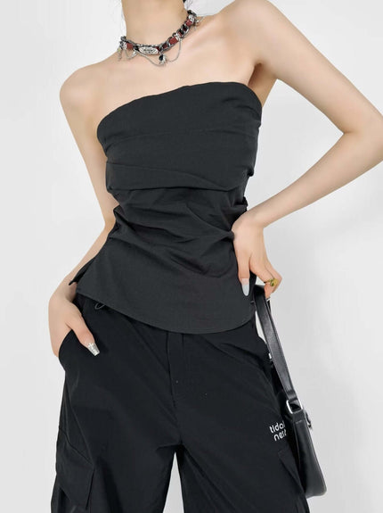 Model wearing Black strapless tank by Grozavu