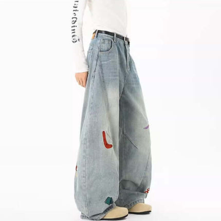 Knife-Cut Embroidered Pants – Loose Fit showcasing a loose fit and unique deconstructed embroidery, perfect for modern street style.