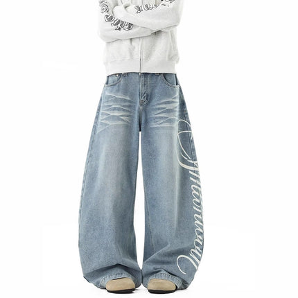 Jeans unisexes rétro délavés usés avec impression de lettres style de rue automne coupe large fluide longueur sol marque de mode