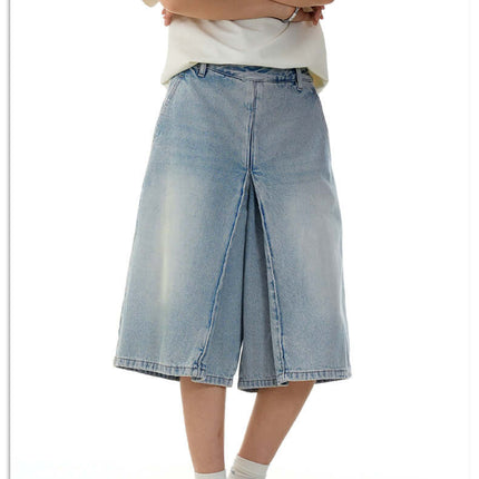 Washed Blue Denim Shorts – Loose Fit displayed on model, showcasing a relaxed summer fit and vintage-inspired style.