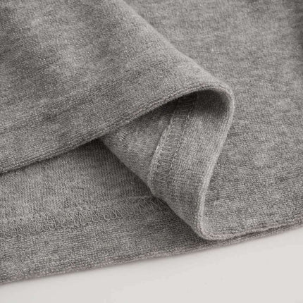 Close-up of the fabric detail of the Stand Collar Button Hoodie – Loose Fit showcasing its soft texture and stitching.