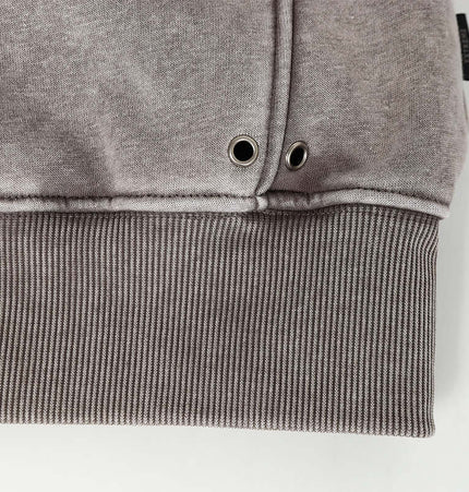 American Retro Washed Hoodie – Loose Fit cuff detail showcasing ribbed hem and eyelet design.