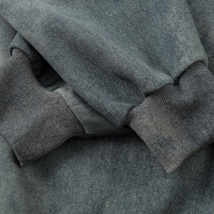Close-up of the cuffs of the Letter Applique Washed Hoodie – Loose Fit showcasing the premium fabric and design details.