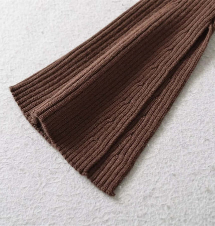 Flared sleeve detail of the Metal Knot Hollow-Out Flare Sleeve Knit Top in brown knit fabric.