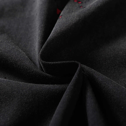 Close-up of the fabric texture of the Retro Splatter Print T-Shirt – Loose Fit, showcasing its premium and relaxed quality.