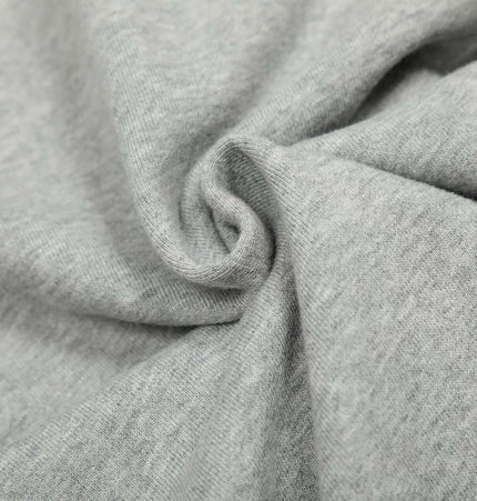 Close-up of soft cotton fabric showcasing the texture of the Washed Retro Zip Hooded Jacket – Fitted.