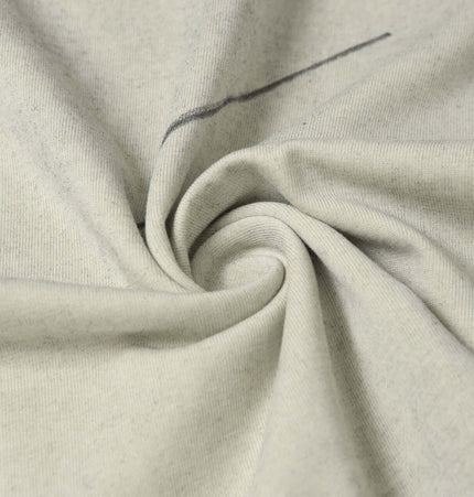 Close-up of soft, washed fabric showcasing texture for Washed Patchwork Letter TShirt – Loose Fit.