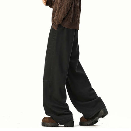 Heavyweight Wide-Leg Pants - Loose Fit worn with a stylish sweater and chunky shoes, showcasing a relaxed, modern look.