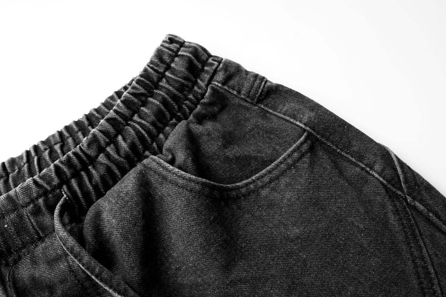 Pantalons en denim délavés usés plissés à revers de style urbain unisexe à jambes larges et droites