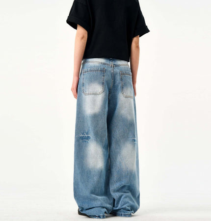 Casual Ripped Light Blue Jeans – Loose Fit shown from the back, featuring a vintage design and relaxed fit.