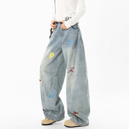 Knife-Cut Embroidered Pants – Loose Fit featuring a deconstructed design and bold embroidery for a trendy street style.