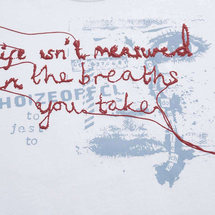 Retro Washed Face Letter T-Shirt – Loose Fit with artistic graphic and text design on a light fabric background.