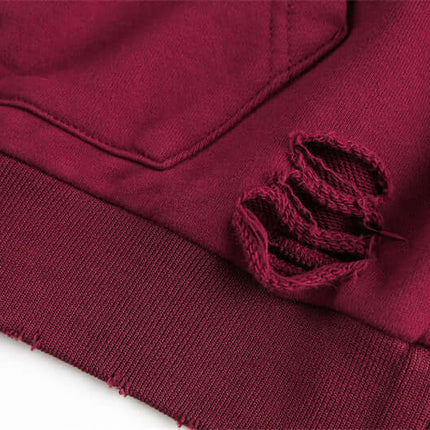 Half-Zip Printed Hoodie – Loose Fit detail showing washed old print design and distressed hem.