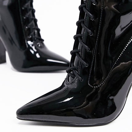 Sleek & Stylish: Black Patent Leather Ankle Boots at €110.00