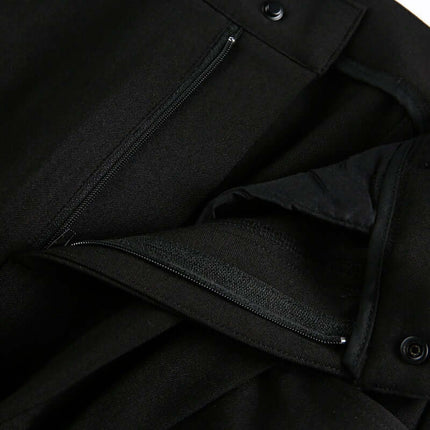 Close-up of the zipper details on the Wide Leg Pleated Plaid Trousers, showcasing the quality and craftsmanship.