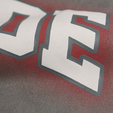 Close-up of the bold print design on the Faux Suede Print Zip-Up Hoodie – Loose Fit.