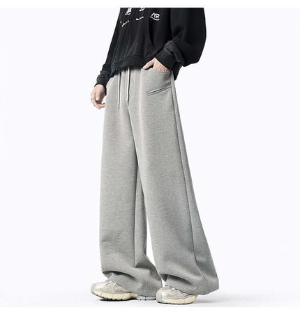 Oversized Winter Casual Long Pants in gray fabric, featuring a relaxed fit and pockets, ideal for winter street style.