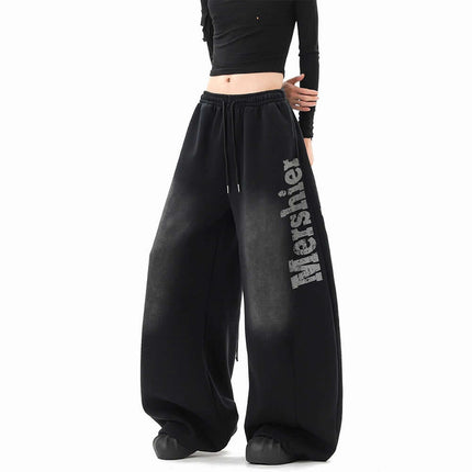 Washed Letter Sweatpants - Loose Fit featuring a wide-leg silhouette and drawstring closure for ultimate comfort.