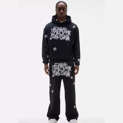 Printed Top and Long Pants – Street Fit worn by model, featuring bold urban design and relaxed fit.