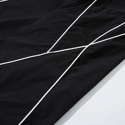 Close-up of Tape Decorated Casual Wide-Leg Pants showcasing contrast tape accents and clean stripe detailing.