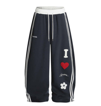 Towel Embroidery Heart Sweatpants featuring bold heart graphic and relaxed fit for casual style