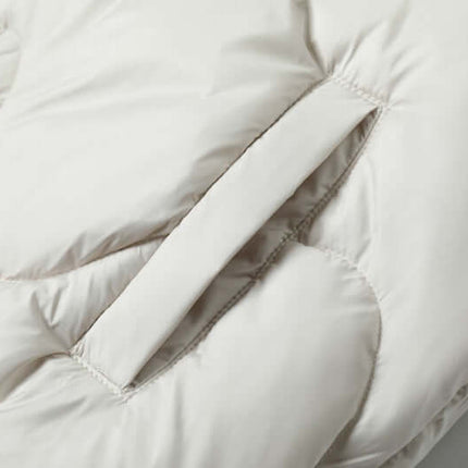 Close-up of the Wave Design Puffer Coat – Loose Fit showcasing its plush texture and unique wave pattern.