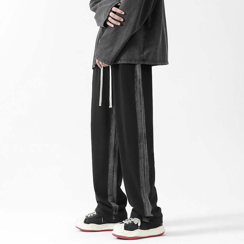 Model wearing Black Washed Tie-Dye [Cotton 3D Waist Stripe Sweatpants] heavyweight oversized sweatpants by Grozavu