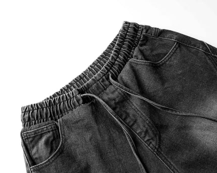 Pantalons en denim délavés usés plissés à revers de style urbain unisexe à jambes larges et droites