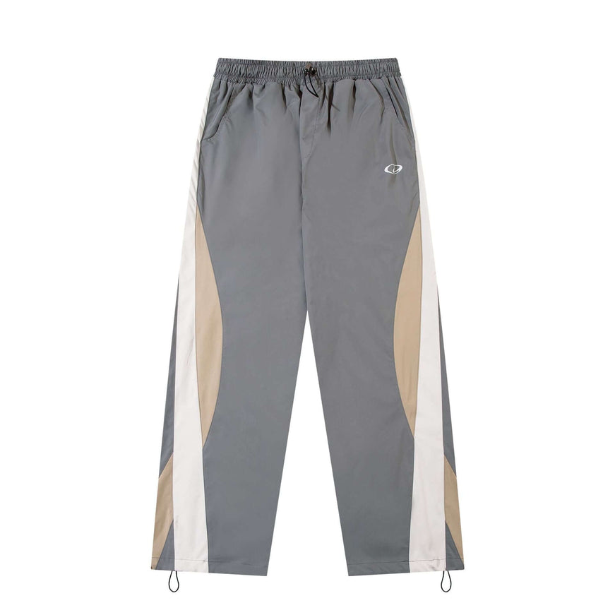 Black paneled technical track pants with Grozavu logo